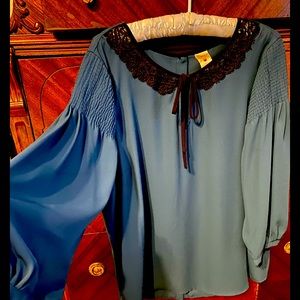 Woman’s green’Disney’ brand blouse